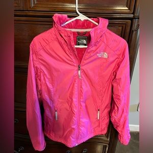 Ladies North face jacket in hot pink. It is a size small. Only worn once